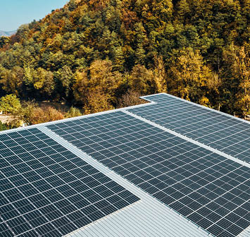 Modern renewable solar energy plant on the roof of modern production building facility in Bosnia and Herzegovina, Europe